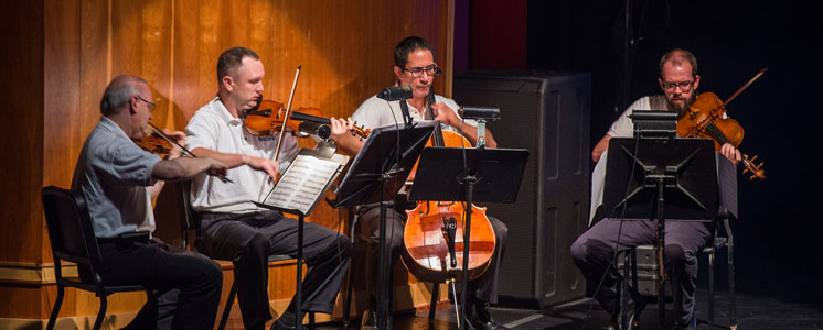 Student playing musical instruments